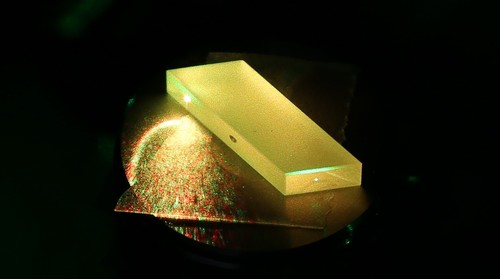 Lithium triborate (LBO) crystal is the nonlinear optical element allowing conversion of green pump source to other wavelengths
